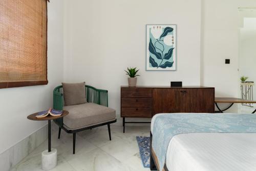 Кровать или кровати в номере Avaanti Boutique Stays By Avaanti Stays