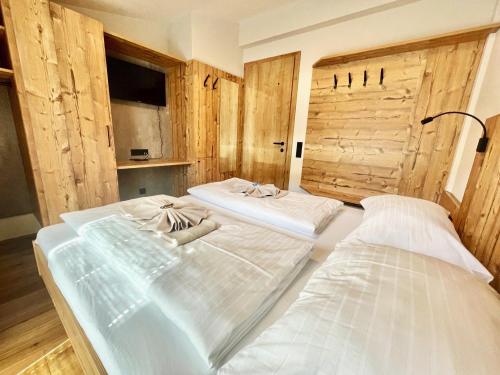 En eller flere senge i et værelse på Deluxe Apartment GRIES NINA