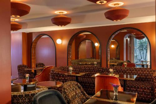 Гостиная зона в Hôtel Ginette à la Folie & Spa