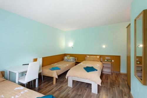 Ένα ή περισσότερα κρεβάτια σε δωμάτιο στο Hotel Neue Krone - Markt Erlbach