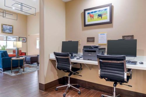 an office with a desk with a computer and chairs at Comfort Suites Keeneland in Lexington