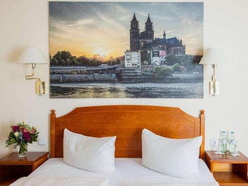 Postel nebo postele na pokoji v ubytování Mercure Hotel Plaza Magdeburg