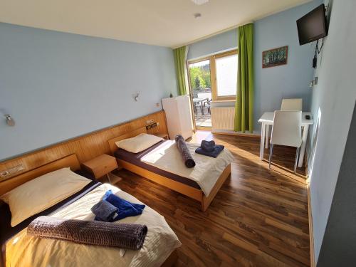 Ένα ή περισσότερα κρεβάτια σε δωμάτιο στο Hotel Neue Krone - Markt Erlbach