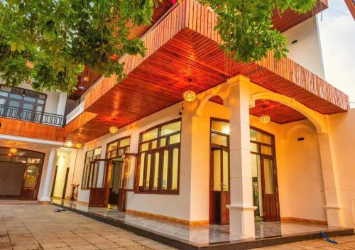 a building with a lot of windows on it at Soc Home in Ba Tơ