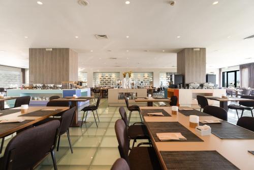 Εστιατόριο ή άλλο μέρος για φαγητό στο Hotel de Guimaraes Business & SPA
