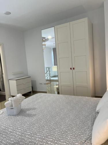 Postel nebo postele na pokoji v ubytování Ancla Real Apartamentos Loft