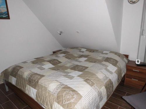 Säng eller sängar i ett rum på Ferienhaus Brigitte
