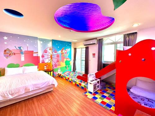 Ein Bett oder Betten in einem Zimmer der Unterkunft Little Apple B&B