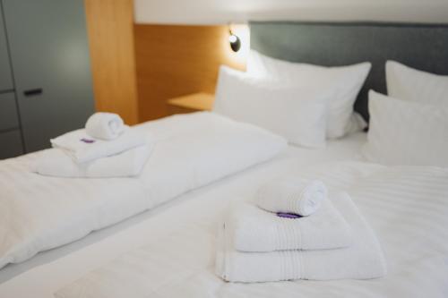 Letto o letti in una camera di Ferienhaus Goldstück im Allgäu