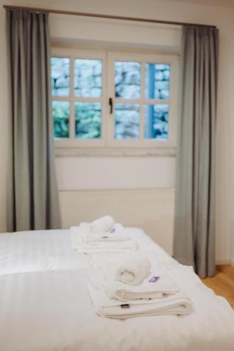 Letto o letti in una camera di Ferienhaus Goldstück im Allgäu