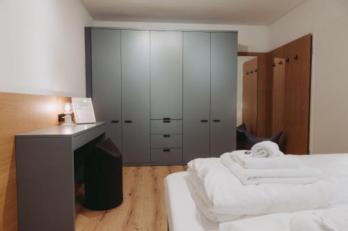 Letto o letti in una camera di Ferienhaus Goldstück im Allgäu