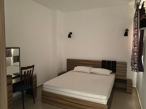 Postel nebo postele na pokoji v ubytování Andreas Residence