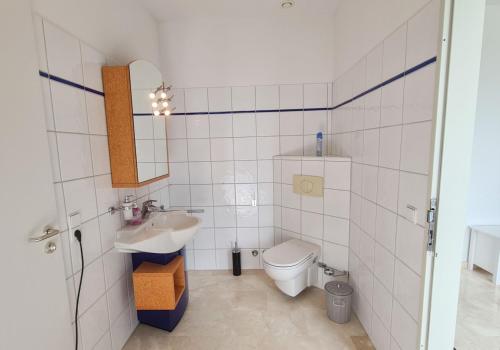 Koupelna v ubytování ein Doppelzimmer und ein Dreibettzimmer bei Hamburg