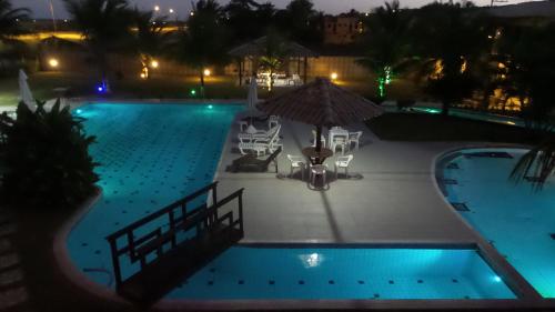 Bazén v ubytování Porto Bali Hotel nebo v jeho okolí