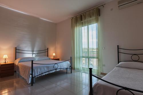 Кровать или кровати в номере Joanne B&B