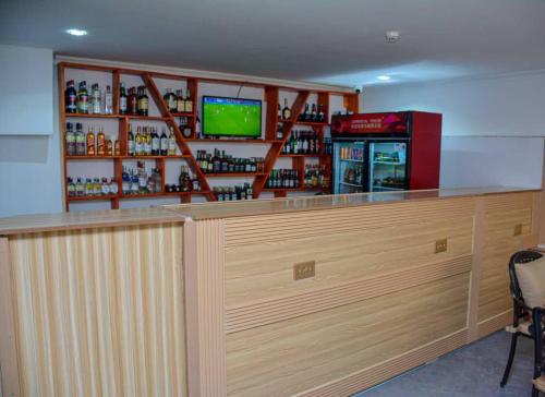 Lounge nebo bar v ubytování UNIQUE ROYAL HOTEL AND SUITeS