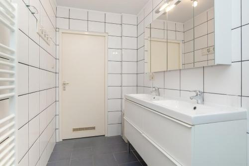 Koupelna v ubytování Hello Zeeland - Vakantiehuis Het Blauwe Hof