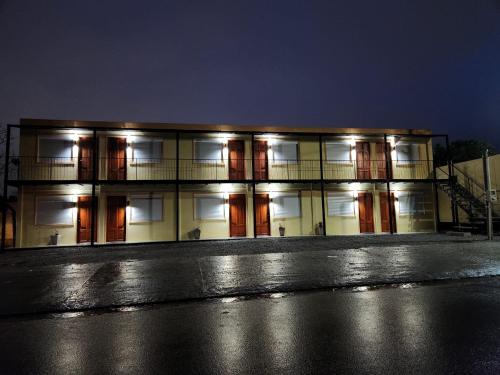 a building with lights on the side of it at Trinidad Inn in Trinidad