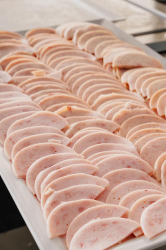 a tray filled with uncooked meat on a table at Nahrawess Resort & Thalasso in Hammamet