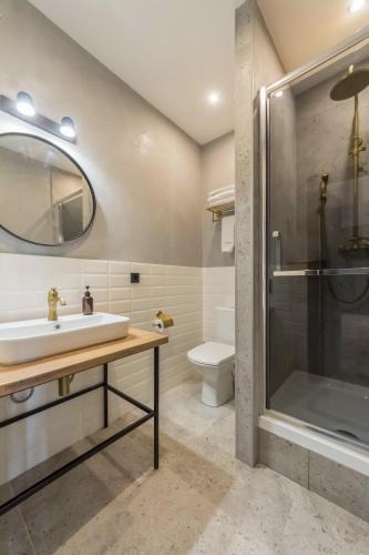 Ένα μπάνιο στο Self Check-in Apartments