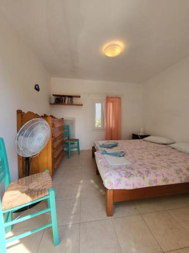 Postel nebo postele na pokoji v ubytování Gardenparadise Sifnaios in Paros