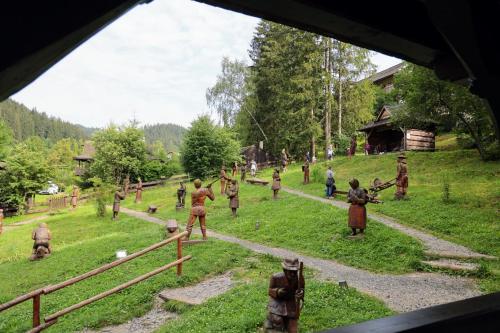 a group of people playing a game in a field at Chalupa Štrčková - srdce Valašska in Vsetín
