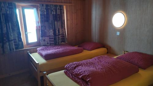 Postel nebo postele na pokoji v ubytování Petit Vélan - Coworking & Coliving