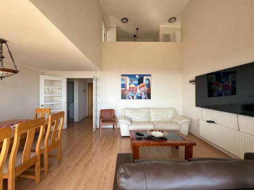 Μια τηλεόραση ή/και κέντρο ψυχαγωγίας στο Exclusive Duplex apartment