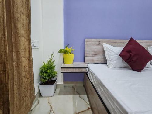 Ένα ή περισσότερα κρεβάτια σε δωμάτιο στο Eve Service apartment