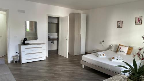 Postel nebo postele na pokoji v ubytování B&B Casa di Nonna Checca