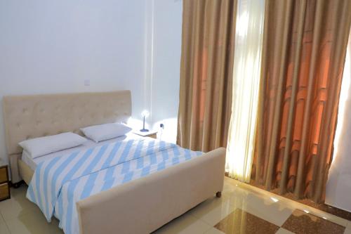 Una cama o camas en una habitación de Welcome Home