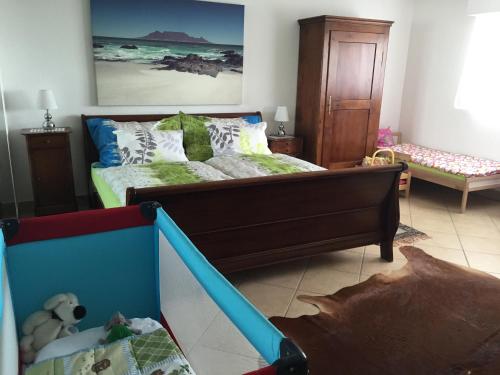 Uma cama ou camas num quarto em Magie Du Léman