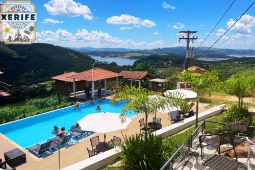 a view of a pool at a resort at Pousada do Xerife in Caconde