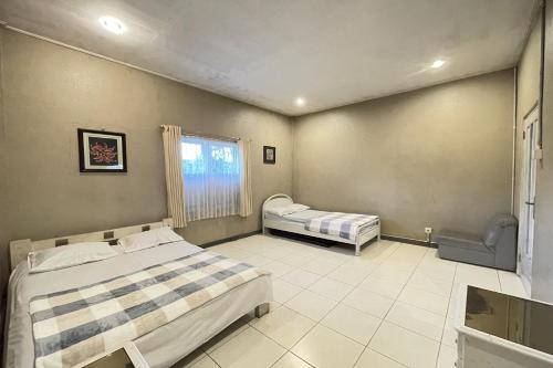 Ένα ή περισσότερα κρεβάτια σε δωμάτιο στο Villa 325 Maribaya