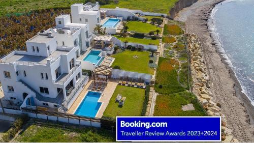 BLUE CORAL BEACH VILLAS three exclusive villas - Poseidon - Nautilus - Oceanos - and - Baby Coral bungalow