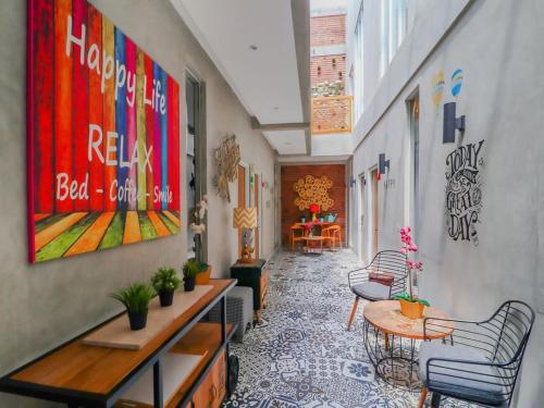 Гостиная зона в The Batik Bed and Coffee Bandung