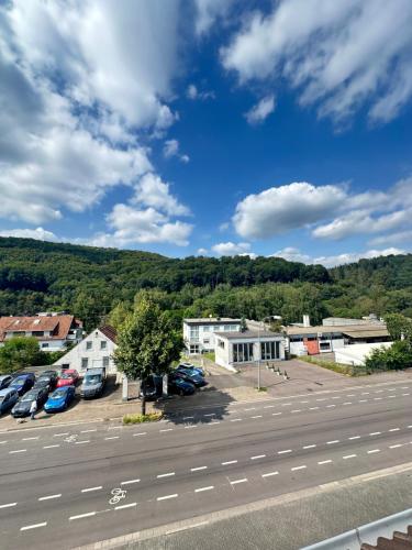 a view of a parking lot with cars parked at WOW Urban Nest Saarbrücken in Scheidt