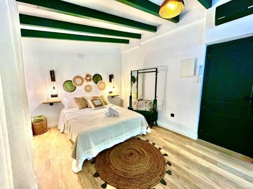 Giường trong phòng chung tại Apartamento vista al mar