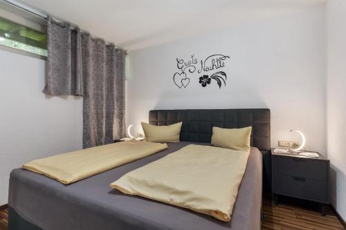 Postel nebo postele na pokoji v ubytování Ferienwohnung Zimmermann