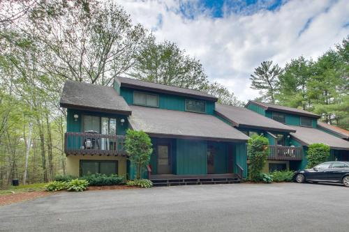 a house with a car parked in front of it at North Conway Condo Less Than 3 Mi to Slopes and Echo Lake in North Conway