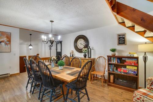 a dining room with a table and chairs at North Conway Condo Less Than 3 Mi to Slopes and Echo Lake in North Conway