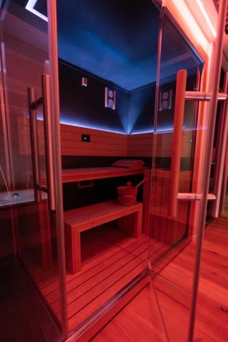a room with a table and a glass wall at Love Me Nemi in Nemi