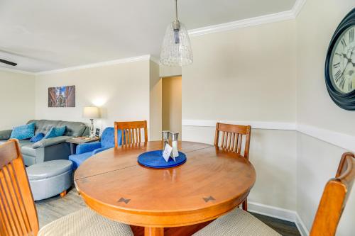 a dining room with a table and a couch at Updated New Bern Home Less Than 3 Mi to Historic Dtwn! in New Bern