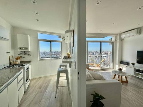 Η κουζίνα ή μικρή κουζίνα στο SKYLINE PISO 20 Pasos de PALERMO 2 BD Amenities