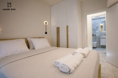 Ένα ή περισσότερα κρεβάτια σε δωμάτιο στο Luxury Stay