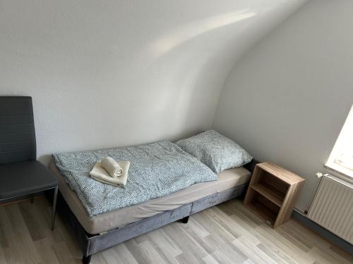 Ένα ή περισσότερα κρεβάτια σε δωμάτιο στο Monteurwohnung Haus Elbert 4