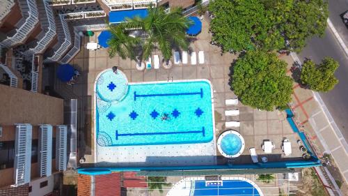 Bazén v ubytování Zahira Hotel Melgar nebo v jeho okolí