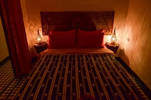 Ένα ή περισσότερα κρεβάτια σε δωμάτιο στο Appartement khmissa