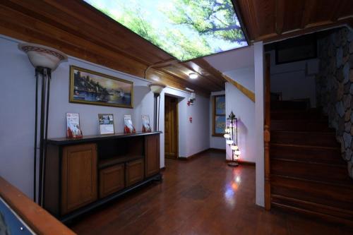 a living room with a skylight on the ceiling at The Trip istanbul Hotel in Istanbul