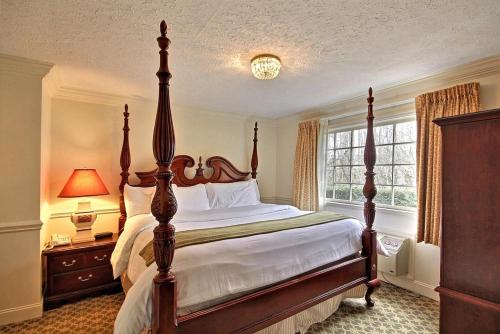 a bedroom with a large bed and a window at The Dillard House in Dillard